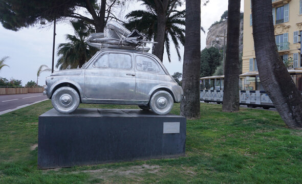 Nice , France - March 9, 2026: A Sunday in Nice, Un dimanche a Nice, is the name of this aluminum cast sculpture of the iconic Fiat 500 car by Stephane Cipre, located in Port Lympia.
