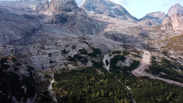 Video drone over Fedaia Lake and Marmolada peak in the Dolomite Alps