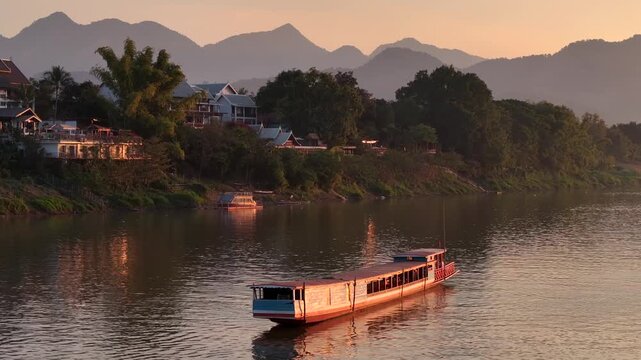 Aerial view of heritage city of Luang Prabang and Mekong river landscape at sunset Time in Laos, Asia. Lao Republic.