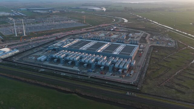 Aerial view of data center construction site at sunset