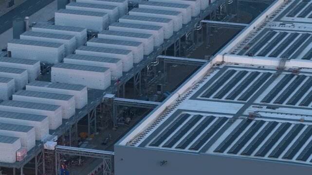 Aerial view of a hyperscale data center with rooftop solar panels