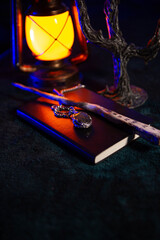 Fototapeta premium Magical artifacts lie under the light of an lamp