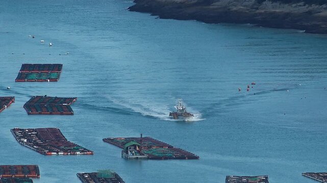 Scenic coastal landscape with abalone farms in the sea of Wando Korea  한국 전라남도 완도 바다의 전복 양식장 풍경