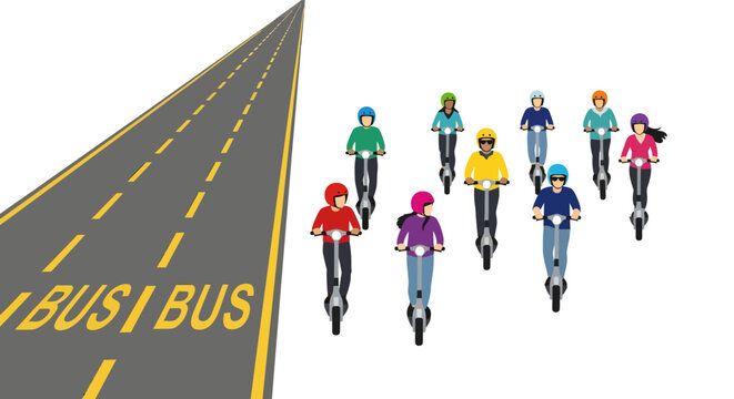 cyclists racing on road next to bus lane