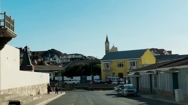 Luderitz city view during the day. View of Felsenkirche (church) and the coastal town of Luderitz with its colourful Germanic architecture, Namibia