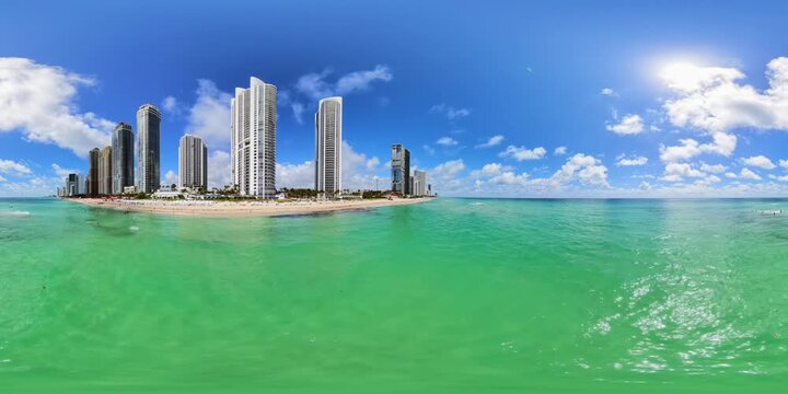 Aerial 360 low water flyover Sunny Isles Beach Florida