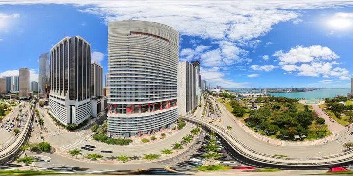 Aerial drone 360 video Downtown Miami over metrorail people mover railroad tram railway
