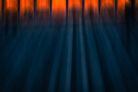 Abstract image created with intentional camera movement in a city square. 