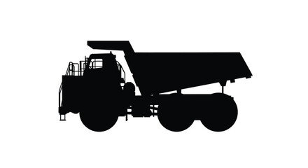 Large mining dump truck shown in a dramatic black silhouette © adobeamena