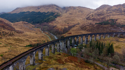 Fototapeta premium Panoramic drone view of the concrete arches of the Glenfinnan Viaduct.