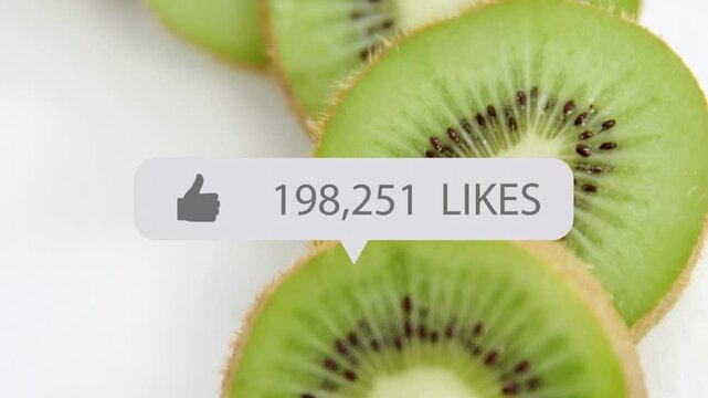 Kiwi slices on white table, likes overlay appearing over fruit and counting to 1M driving marketing