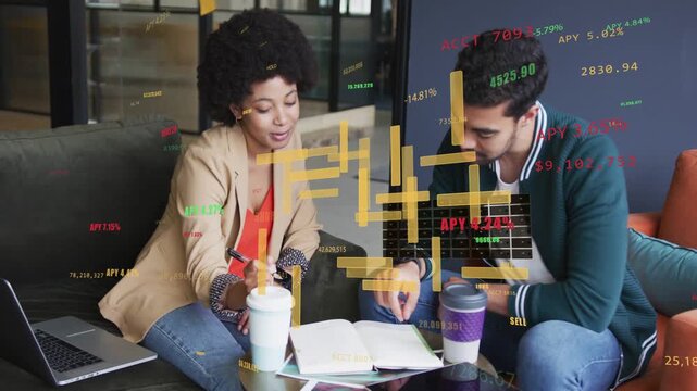 Man pointing at notebook, starting colleagues consulting notes and analyzing market charts
