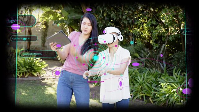 Tablet tapping initiating, guide gesturing while senior using headset and HUD to view object above