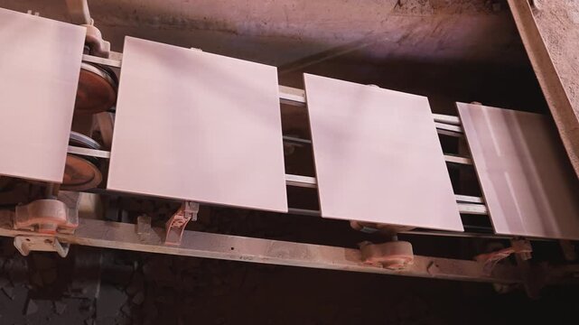 Ceramic Tiles Moving on Conveyor Belt in Industrial Production Line