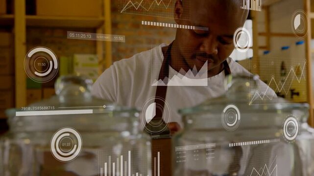 Camera moving forward, shop attendant inspecting jars, packing box as HUD overlay tracking stock