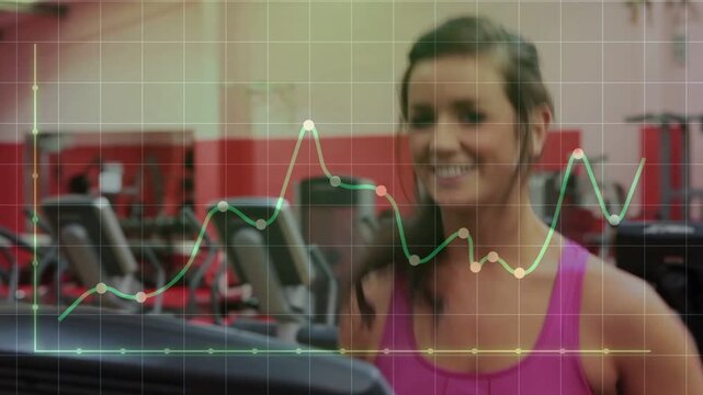 Woman pressing console starting run, jogging and swinging arms while tracking metrics