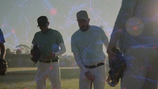 Five players walking across sports field, star net linking them, leader tapping bat starting drill