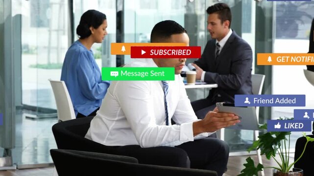 Man tapping tablet in lobby, social notifications stacking then fading, colleague joining to view