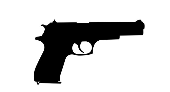 A black handgun shown in profile a stark dramatic silhouette