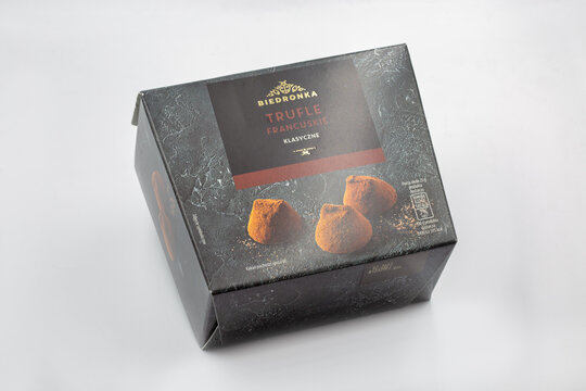 Biedronka classic French truffles in dark premium box closeup.