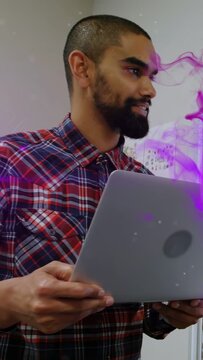 Vertical video: Peer asking host holding laptop speaking glancing down purple smoke rising to demo
