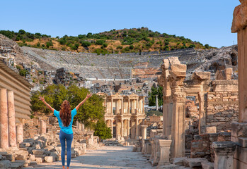 Celsus Library in Ephesus with Amphitheater in Ephesus in the background  (Efes) - Selcuk, Turkey © muratart