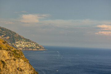 Fototapeta premium Beautiful cliffside Positano village and coastline of the Amalfi Coast in Italy viewed from the sea