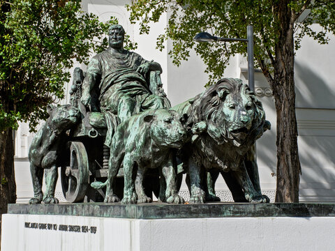 Bronze sculpture of Marcus Antonius with a chariot team of lions in front of the Secession building in Vienna, Austria statue of king charles iv in prague