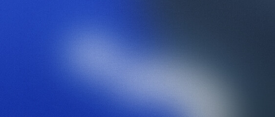 Obraz premium Abstract blue background with a soft light gradient and a grainy, textured surface effect