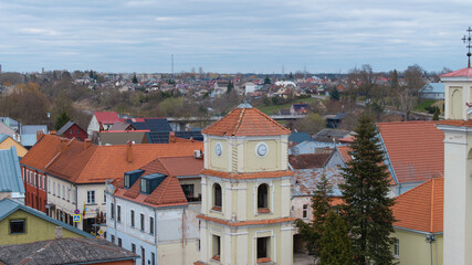 Obraz premium Calvinist church and bell tower in Kedainiai old town, historic European architecture in Lithuania