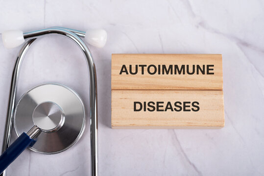 Stethoscope and wood block with text Autoimmune Diseases