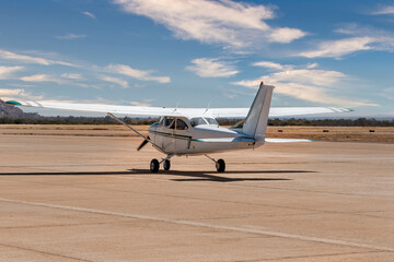 Fototapeta premium Small Propeller Airplane for Private Charter and Flight School Training on Runway