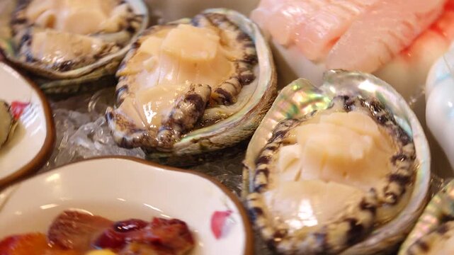 Fresh sliced raw fish and abalone sashimi platter K-food