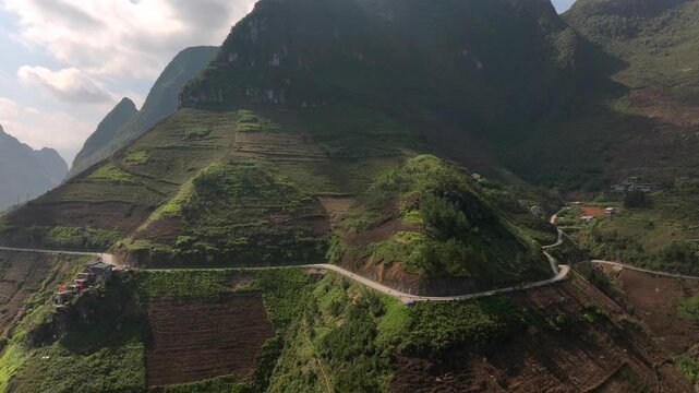 The winding road of Ma Pi Leng Pass in Vietnam. A Part of a Famous Ha Giang Loop. Beautiful destinations Asia. Aerial.