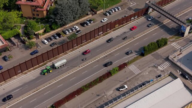 Aerial Freeway Traffic: An eye-level shot captures a busy freeway with an array of vehicles. This high-angle perspective offers a unique view of the transportation network and the flow of traffic. 