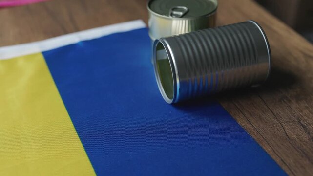 Canned Foods on Ukrainian National Flag Close-up