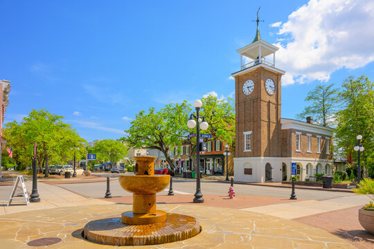 The historic Old Market Building and Town Clock across from the National Humane Alliance fountain along Front Street, the historic main street of Georgetown, South Carolina.