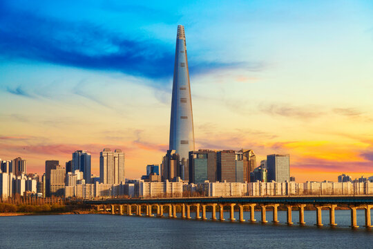 Seoul city skyline with Han River, Skyscrapers and Lotte tower during sunset
