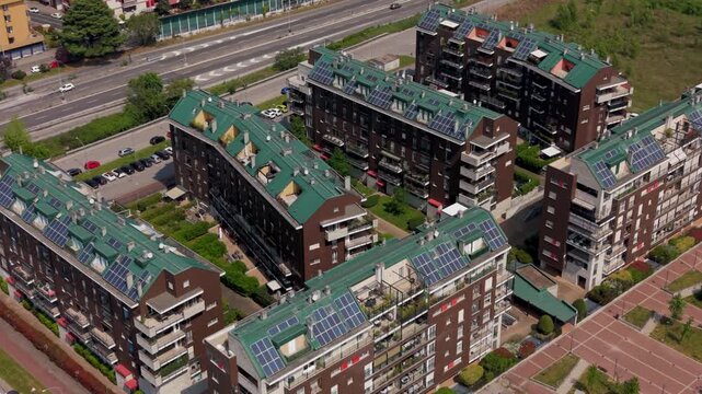 Residential Complex: An aerial view showcases a meticulously designed residential complex, featuring modern architecture. The image reflects harmonious integration within the urban landscape.