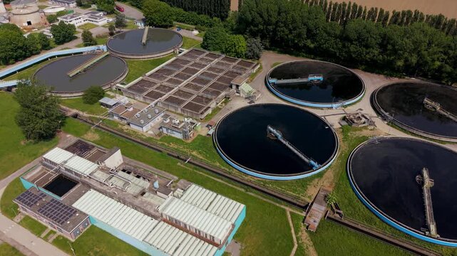 Water Treatment Facility: An aerial view showcases the intricate infrastructure of a water treatment facility, highlighting the processes dedicated to purifying and cleaning water for public use. 