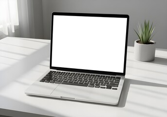 Fototapeta premium Minimalist Laptop Mockup on Clean White Desk with Plant and Soft Natural Light Shadows. 