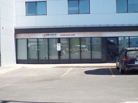 Nepean, Ontario, Canada &ndash; July 27, 2025: The "Branch Audiovisual" storefront at 36 Antares Drive features a branded sign above large windows and a designated parking area.