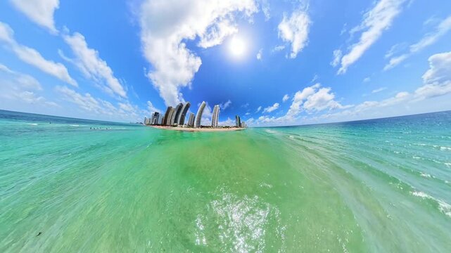 Ultrawide angle aerial drone video flying over the beach Summer 2026