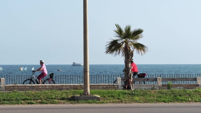 Senior Couple Cycling Palma de Mallorca Paseo Maritimo