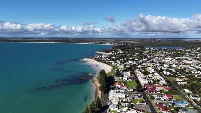 Robe, South Australia Coastline: 4K aerial drone footage of coastal town, houses and estates, marina, sandy beaches, ocean shoreline, cliffs and seaside landscape, local traffics and roads