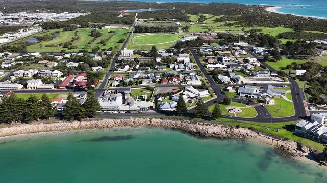 Robe, South Australia Coastline: 4K aerial drone footage of coastal town, houses and estates, marina, sandy beaches, ocean shoreline, cliffs and seaside landscape, local traffics and roads