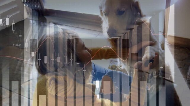 Woman lifting golden dog after eye contact on landing to hug, finance graphs overlay showing gains