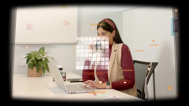 Woman at desk answering phone call and juggling laptop tasks, using HUD for business coordination