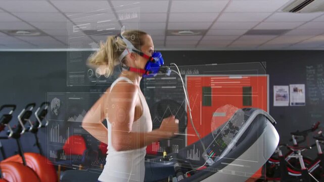 Mid-adult woman running on treadmill, mask tubing initiating live fitness testing with dashboards