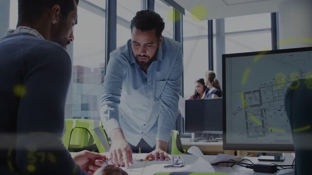 Lead smoothing plans, leaning over table, pointing, guiding designers, animated plan marking zones